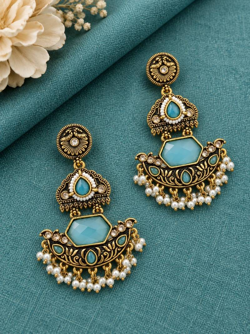 Gold oxidized sky blue stone chandbali earrings