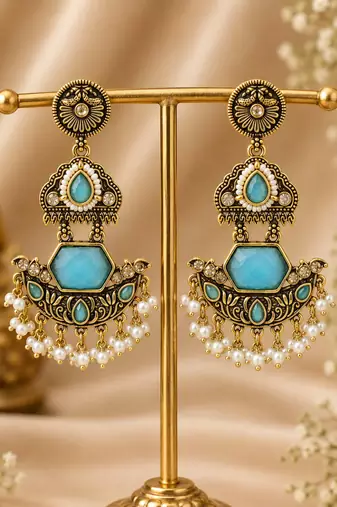 Gold oxidized sky blue stone chandbali earrings