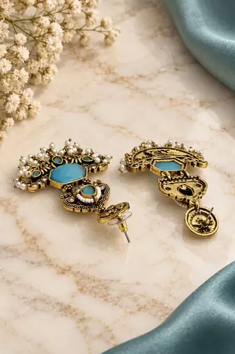 Gold oxidized sky blue stone chandbali earrings