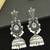 German silver bird motif clear long dome jhumka earrings