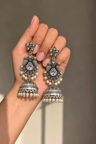 German silver bird motif clear long dome jhumka earrings
