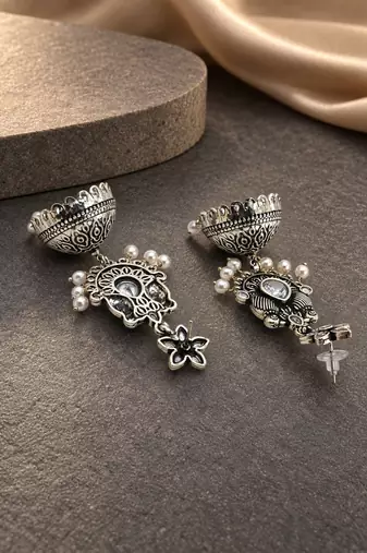 German silver bird motif clear long dome jhumka earrings