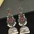 German silver bird motif red green long dome jhumka earrings