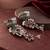 German silver bird motif red ruby long dome jhumka earrings
