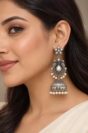 German silver bird motif white long dome jhumka earrings