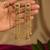 Gold plated lotus motif long kashmiri earrings