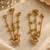 Gold plated lotus motif long kashmiri earrings