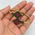 Gold plated geometric red green adjustable kada bracelet