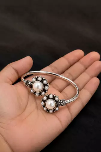 German silver oxidized floral motif white kada bracelet