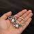 German silver oxidized floral motif white kada bracelet