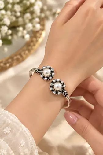 German silver oxidized floral motif white kada bracelet