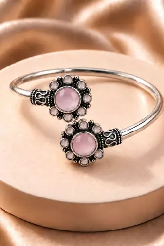 German silver oxidized floral motif pink kada bracelet