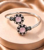 German silver oxidized floral motif pink kada bracelet