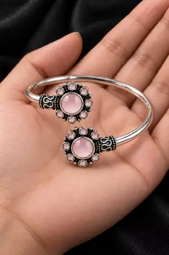 German silver oxidized floral motif pink kada bracelet