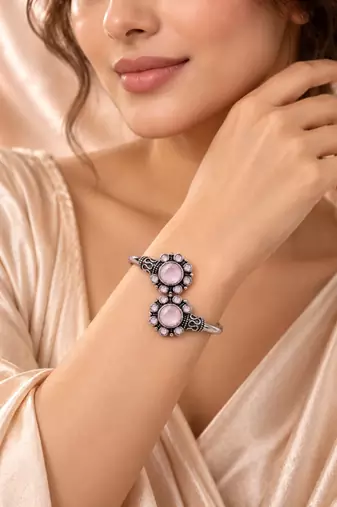 German silver oxidized floral motif pink kada bracelet