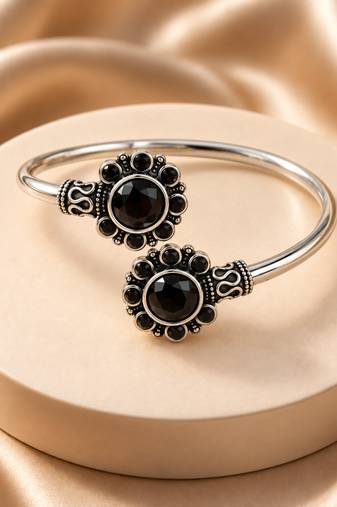 German silver oxidized floral motif black kada bracelet