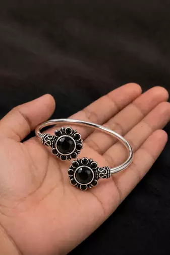German silver oxidized floral motif black kada bracelet