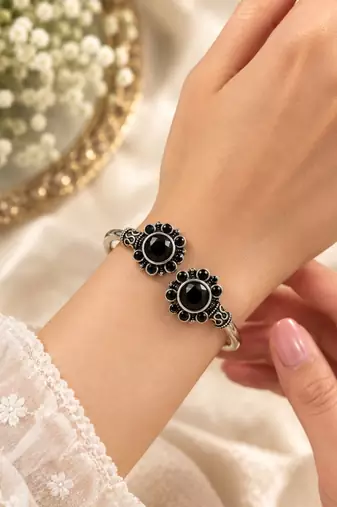 German silver oxidized floral motif black kada bracelet