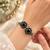 German silver oxidized floral motif black kada bracelet