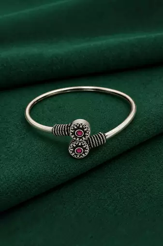 German silver oxidized floral motif red ruby kada bracelet