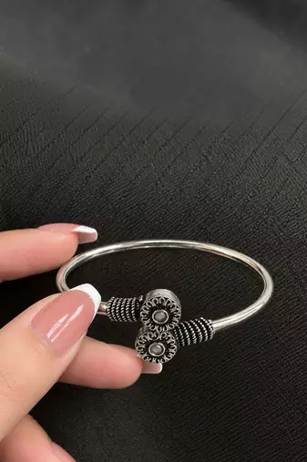 German silver oxidized floral motif white kada bracelet