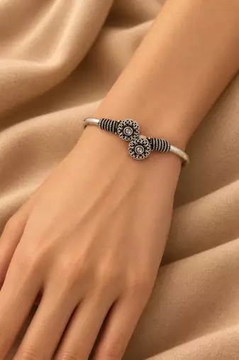 German silver oxidized floral motif white kada bracelet