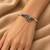 German silver oxidized floral motif white kada bracelet