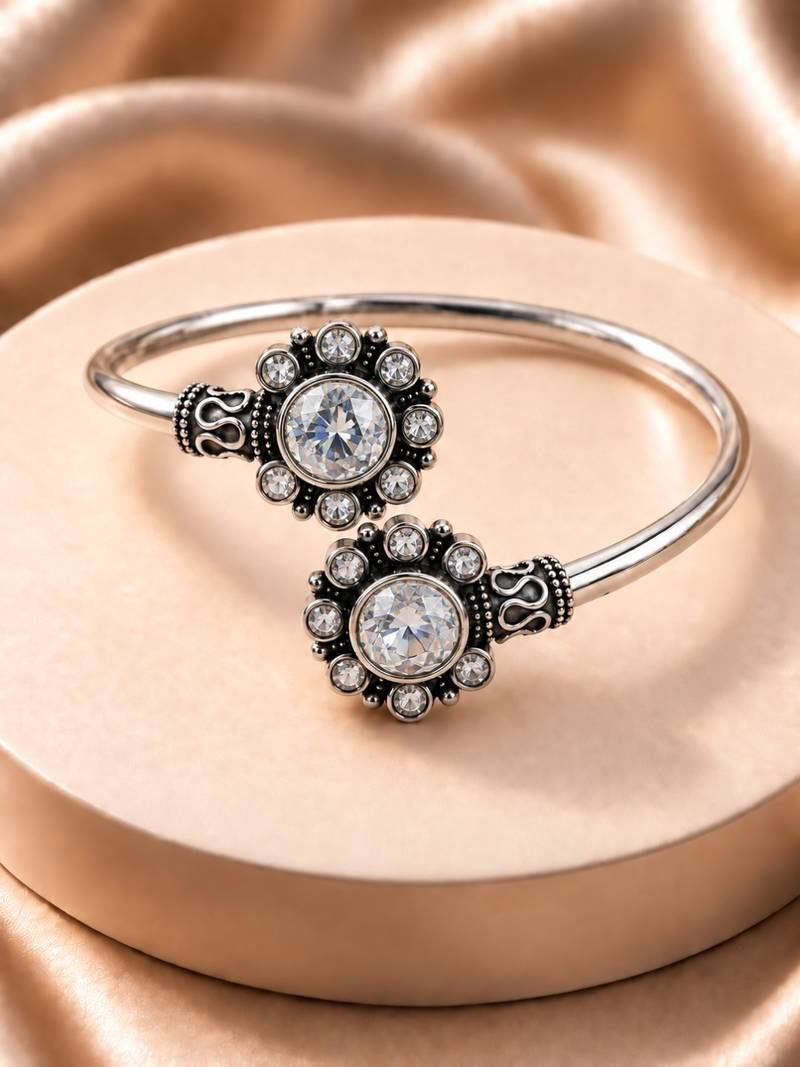 German silver oxidized floral motif clear kada bracelet