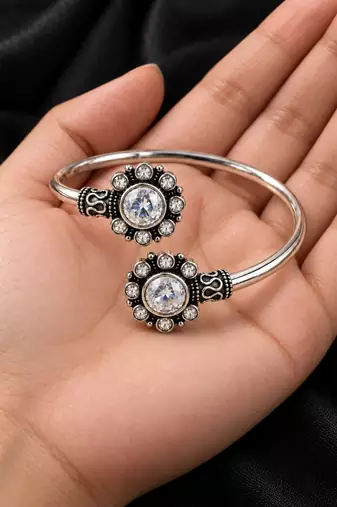 German silver oxidized floral motif clear kada bracelet