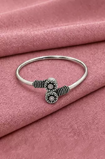 German silver oxidized floral motif pink kada bracelet