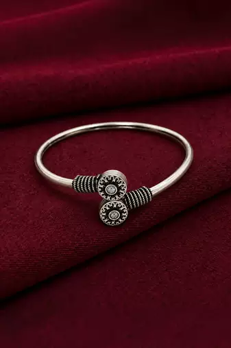 German silver oxidized floral motif clear kada bracelet