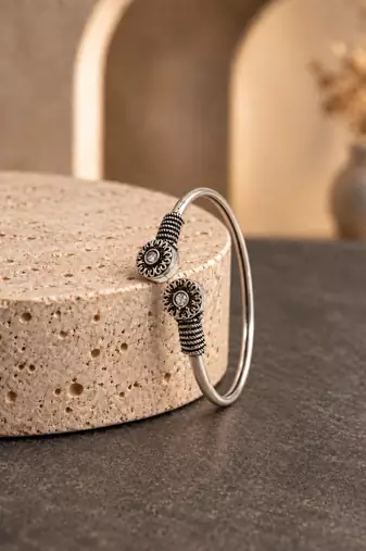 German silver oxidized floral motif clear kada bracelet