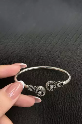 German silver oxidized floral motif clear kada bracelet