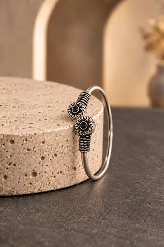 German silver oxidized floral motif black kada bracelet