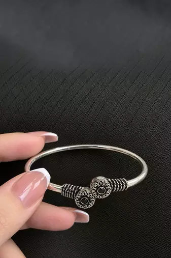 German silver oxidized floral motif black kada bracelet