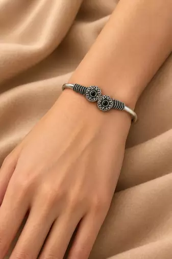 German silver oxidized floral motif black kada bracelet
