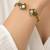 Gold plated geometric white adjustable kada bracelet