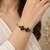 Gold plated geometric black adjustable kada bracelet