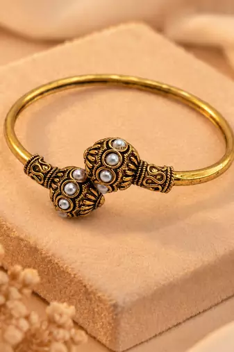 Gold plated white adjustable kada bracelet