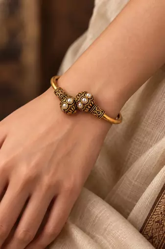 Gold plated white adjustable kada bracelet