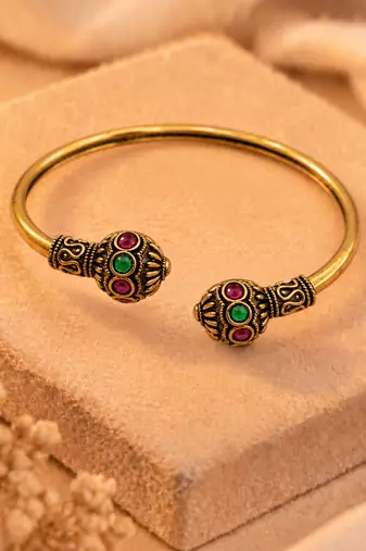 Gold plated red green adjustable kada bracelet