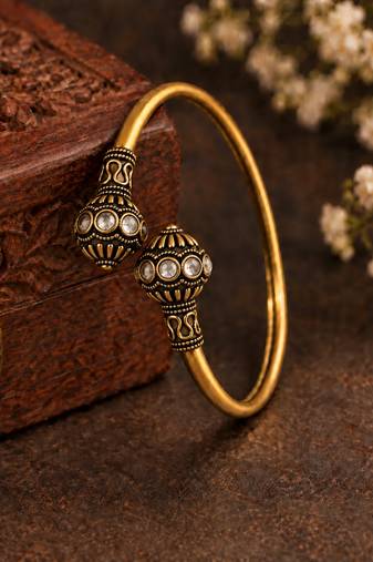 Gold plated pink adjustable kada bracelet
