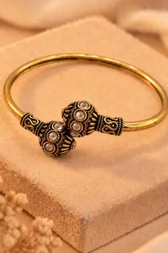 Gold plated pink adjustable kada bracelet