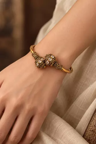 Gold plated pink adjustable kada bracelet