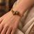 Gold plated clear adjustable kada bracelet