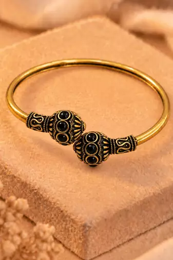 Gold plated black adjustable kada bracelet