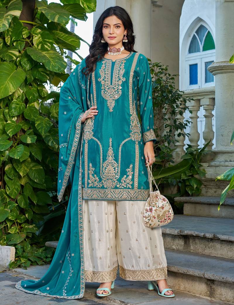 Blue fancy fabric embroidered free size suit