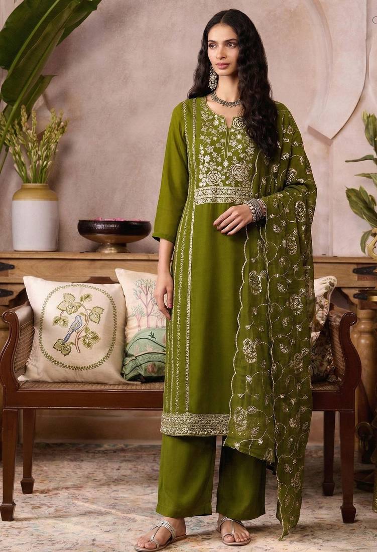 Green organza zari embroidered   sequins and beads free size suit