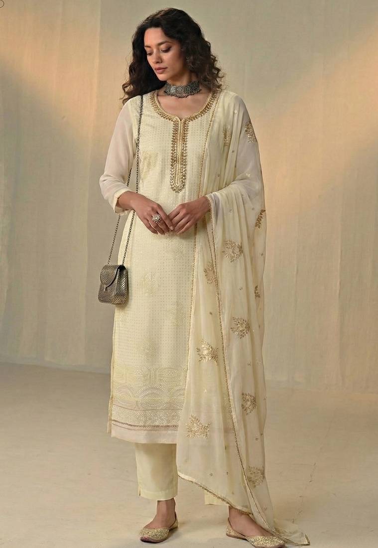 Cream georgette embroidered with multi thread and sequins work along with khatli work free size suit
