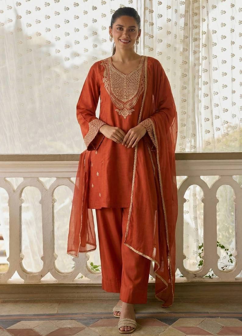 Orange cotton silk zari embroidered & sequins free size suit